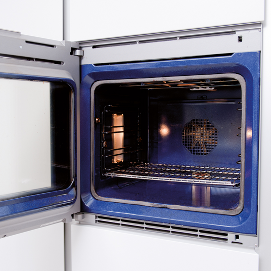 Open oven with blue interior on a white background