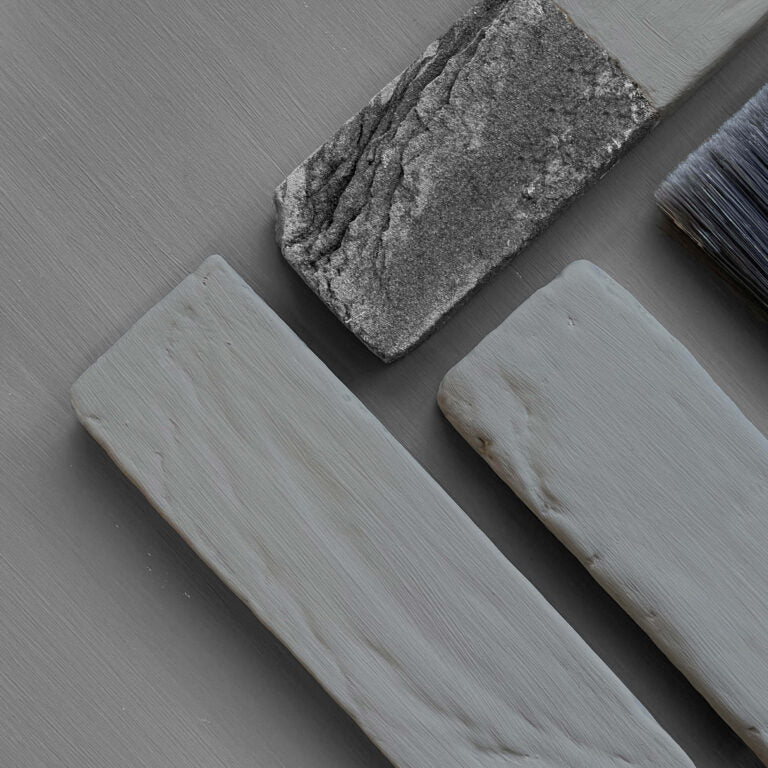 Paint being sampled on 3 rocks. 