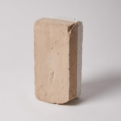 Beige brick on a white background