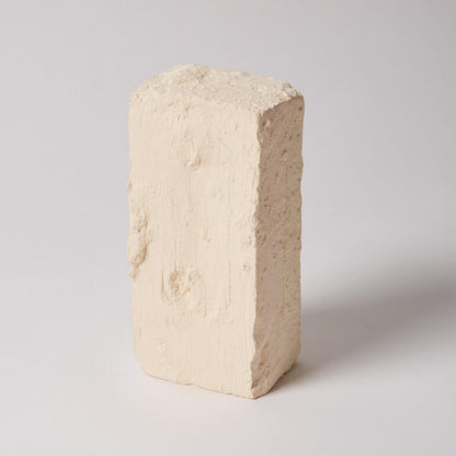 Beige ceramic brick on a light gray background