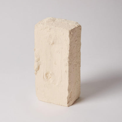 Beige ceramic brick on a light gray background