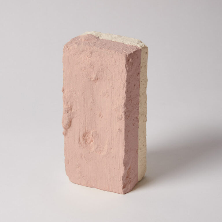 Pink brick on a white background
