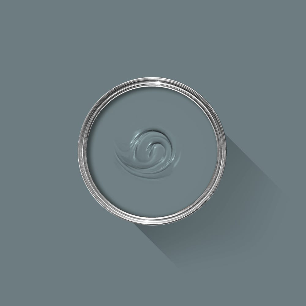 Gray paint swatch with a metallic rim on a gray background