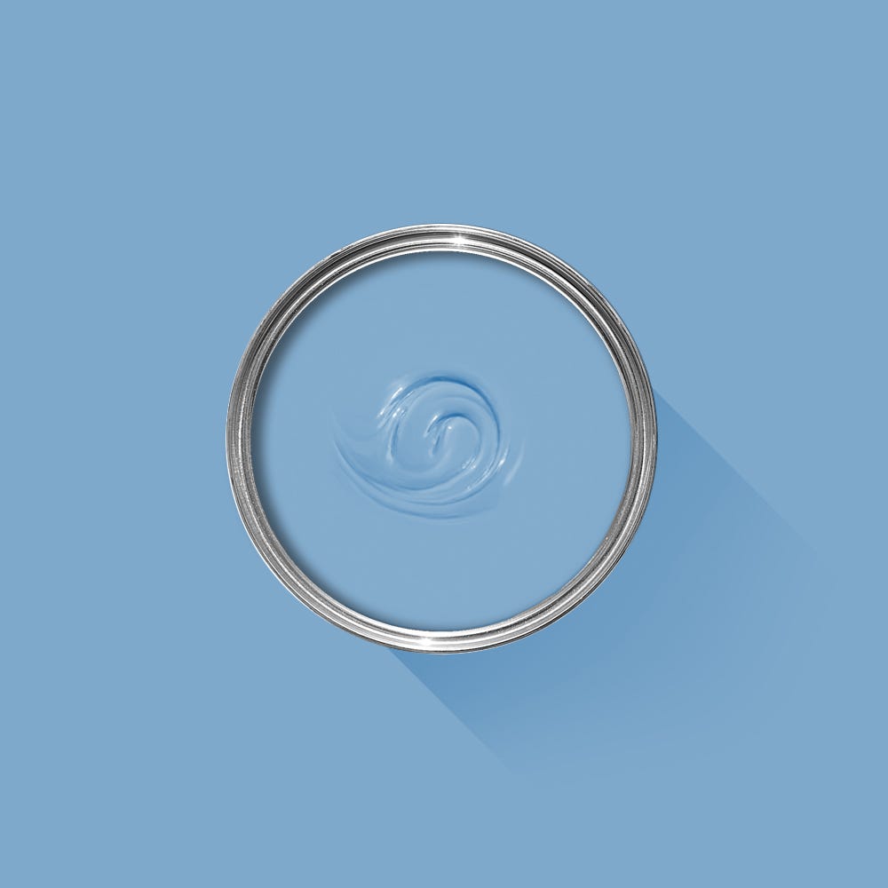 Clear glass lid with water droplet on a blue background