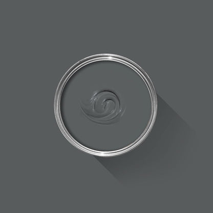 Gray paint swatch with a metallic rim on a gray background
