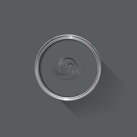 Gray paint swatch with a metallic rim on a gray background