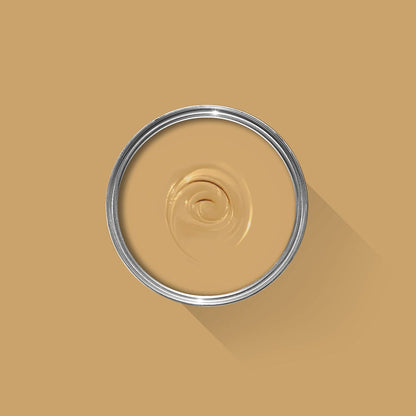 Beige paint swatch with a metal ring on a beige background