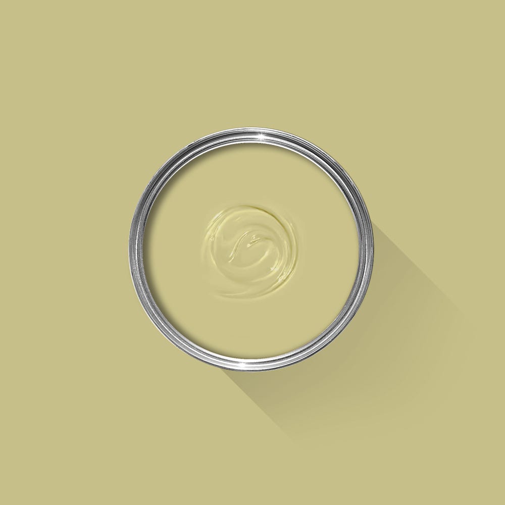 Clear liquid in a metallic ring on a beige background