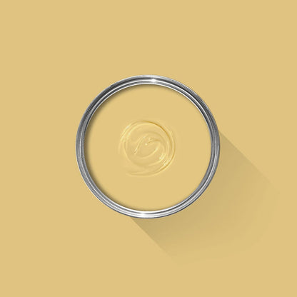 Metallic ring with a central design on a yellow background