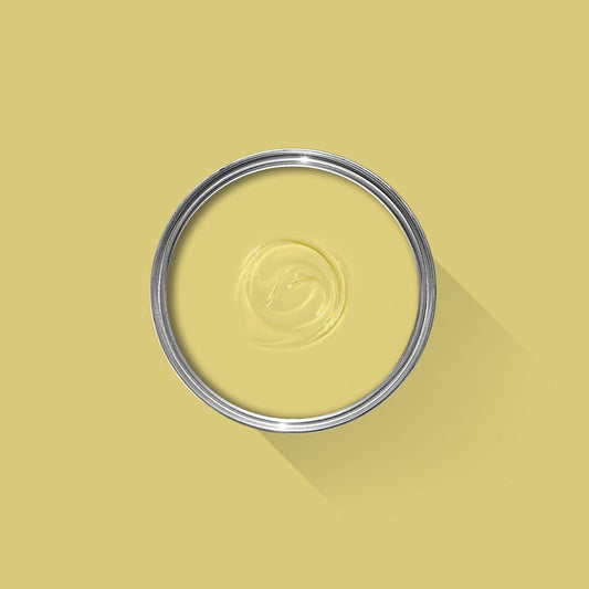 Metallic ring with a central design on a yellow background