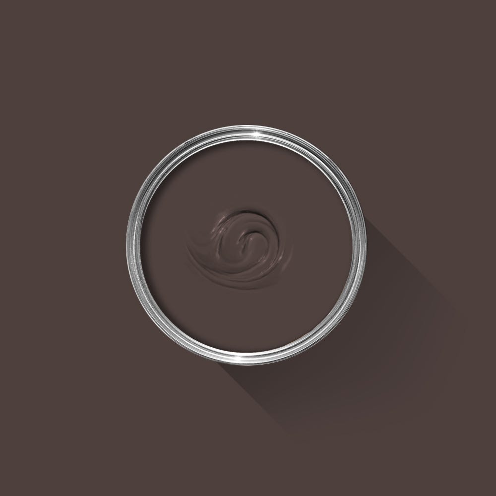 Brown paint swatch in a circular container on a brown background
