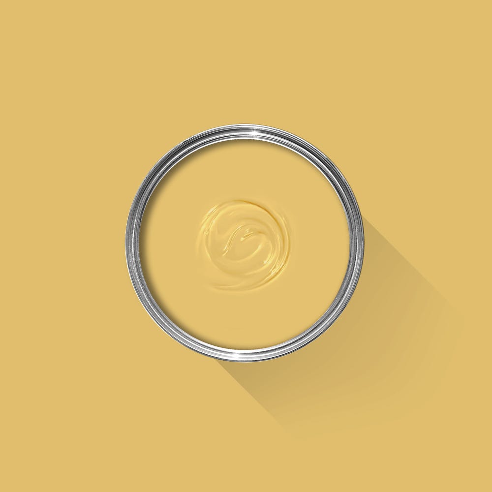 Metallic ring with a central swirl on a yellow background