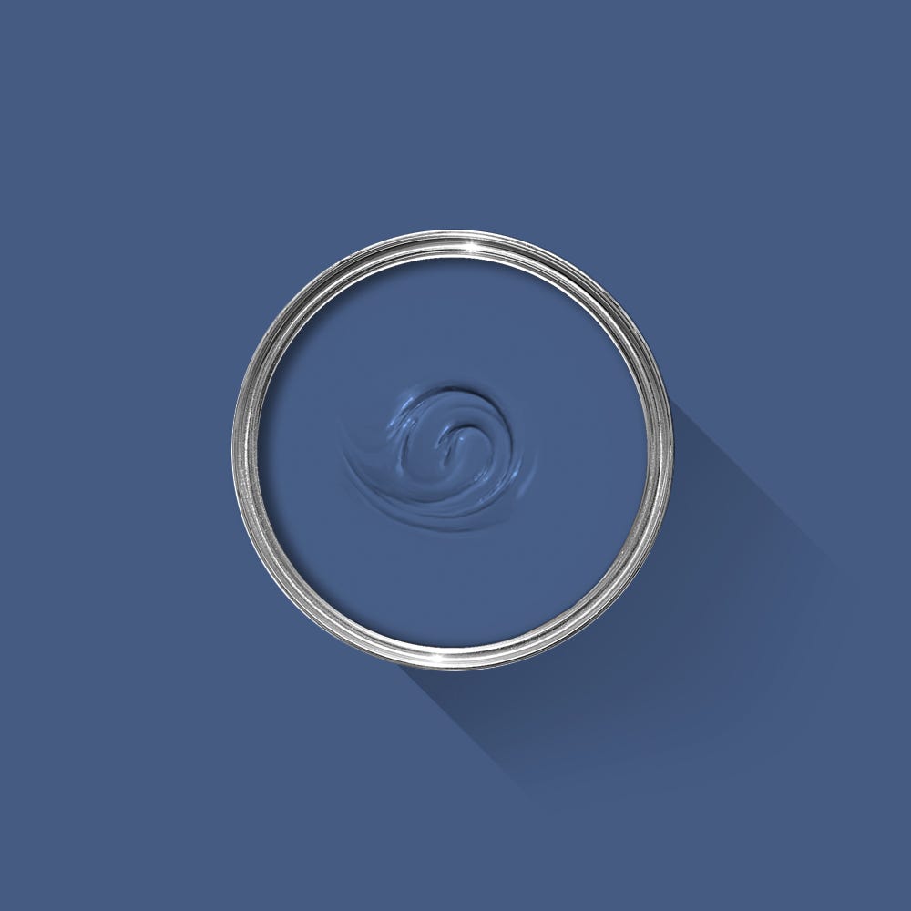 Blue paint swatch with a silver lid on a blue background
