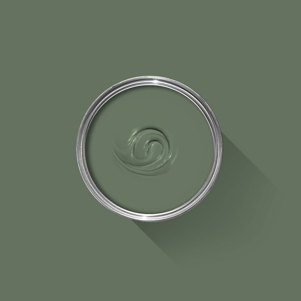 Green paint swatch in a circular container on a green background