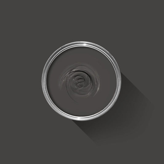 Clear glass with a silver rim on a dark gray background