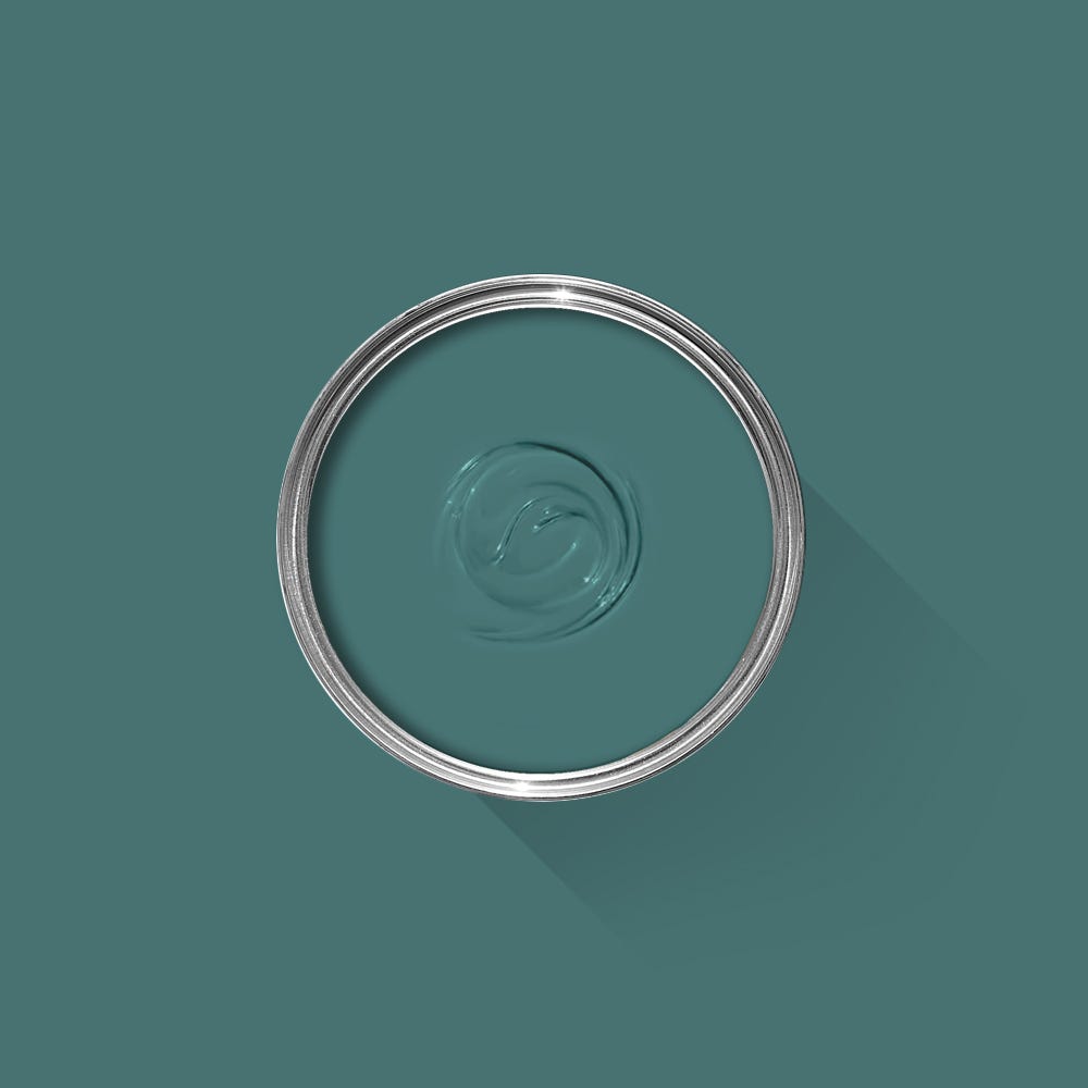 Teal paint sample with a silver lid on a teal background