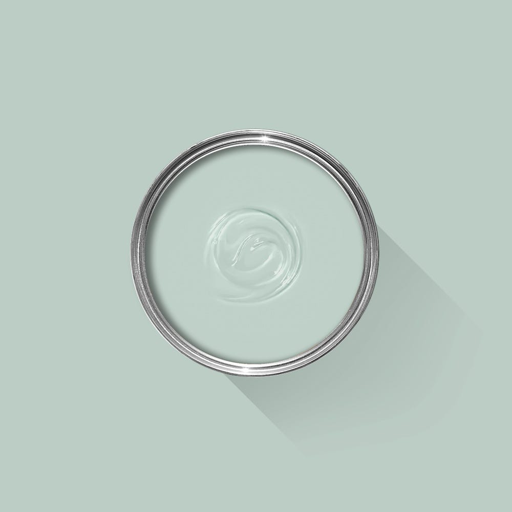 Clear glass lid on a light green background