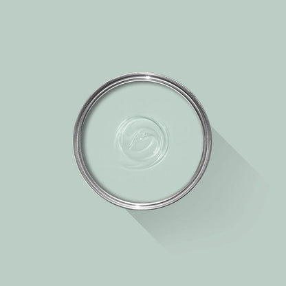 Clear glass lid on a light green background