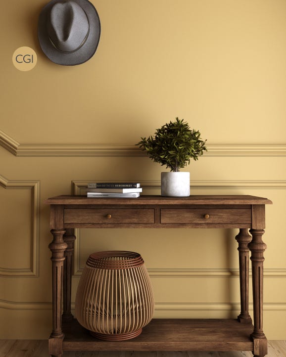 Wooden console table with a plant, basket, and hat against a yellow wall.