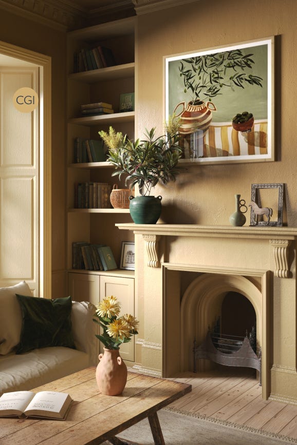 Living room with a fireplace, bookshelf, and decorative items.