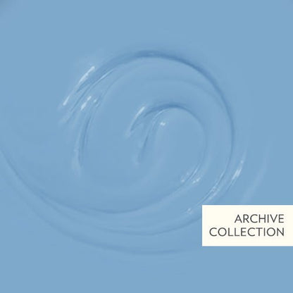 Close-up of light blue paint swatch with 'Archive Collection' label