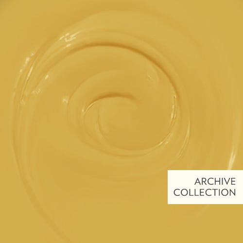 Close-up of a yellow surface with a circular pattern, labeled 'Archive Collection'.