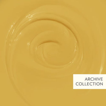 Close-up of a yellow surface with a circular pattern, labeled 'Archive Collection'.