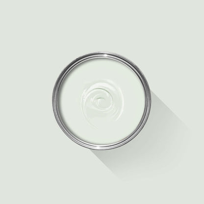 Clear glass lid with a metal rim on a light gray background