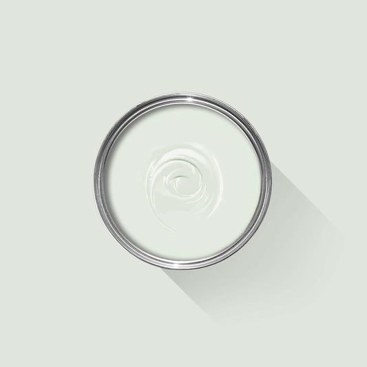 Clear glass lid with a metal rim on a light gray background