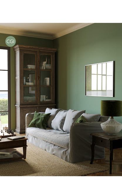 Living room with a gray sofa, green cushions, and a wooden cabinet.