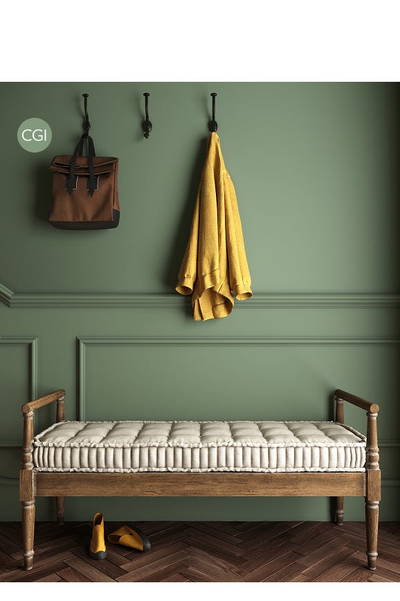 Wooden bench with white cushion against a green wall with hooks and a bag and coat.