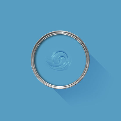 Metallic ring with water droplet design on a blue background