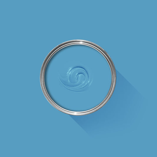 Metallic ring with water droplet design on a blue background