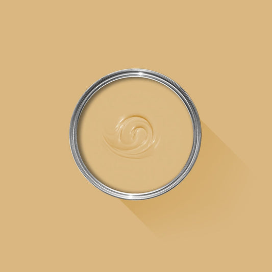 Close-up of a glass jar with a metal lid on a beige background