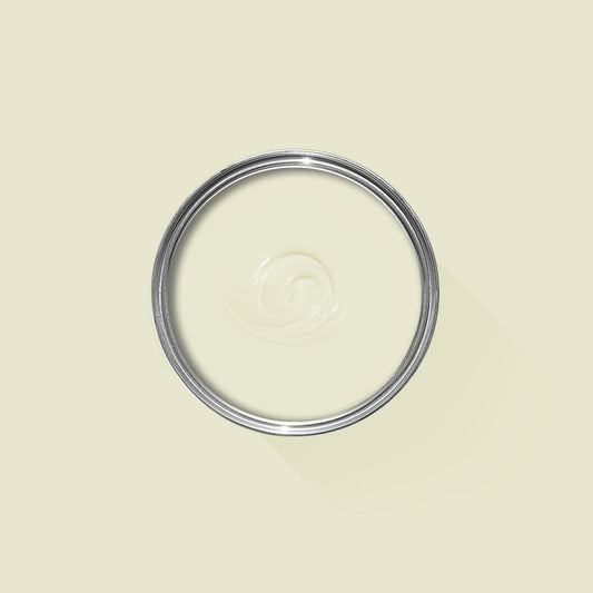 Clear glass lid with metal rim on a beige background