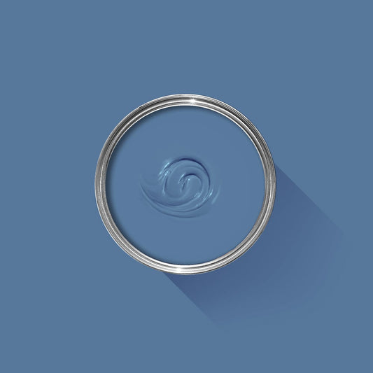 Clear container with a silver lid on a blue background