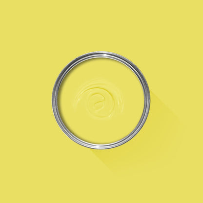 Metallic ring with a logo on a yellow background